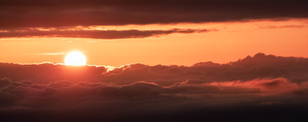 Aerial Cloudscape during morning Sunrise Sky. British Columbia, Canada. Nature Background