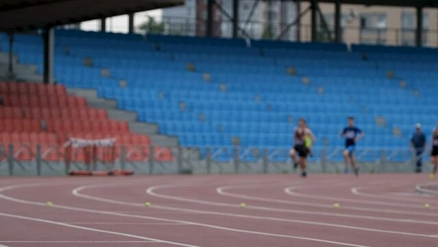 male athletes running 800 meters race