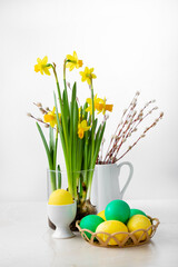 Spring flowers and eggs on light table