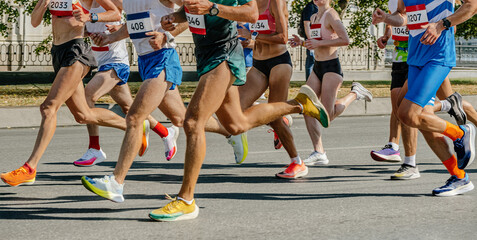 group runners athletes running city marathon