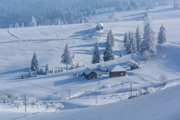 Winter fairytale in the mountain villages of the Carpathians, Transylvania, Romania
