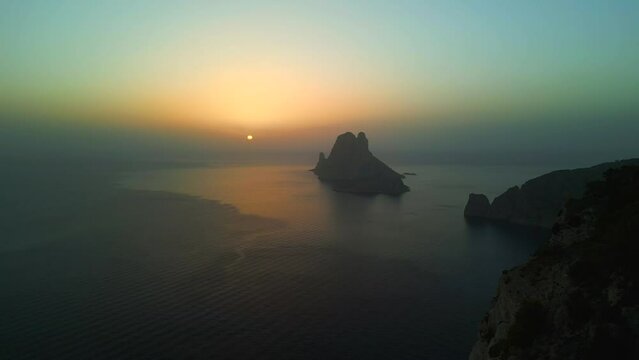 Sunset, golden hour at ibiza es vedra island. Perfect aerial view flight drone