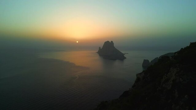 Fairytale Sunset at ibiza es vedra island. Lovely aerial view flight drone
