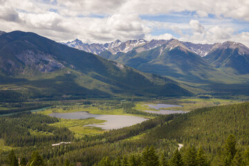 Fototapeta premium Mountains under the blue sky. Traveling Banff, Alberta, Canada. Alberta, Canada Beautiful landscape with Rocky Mountains