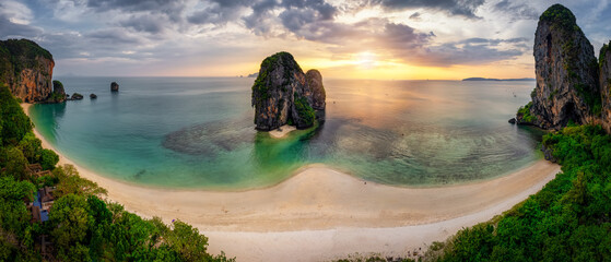 Wide panoramic aerial view of the beautiful Phra Nang Cave beach at the Krabi district, Thailand, during sunset time