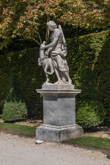 Antique sculpture in Gardens of Versailles palace. Versailles, France.