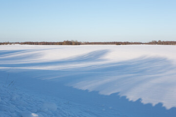 sunny, snowy winter day in the countryside