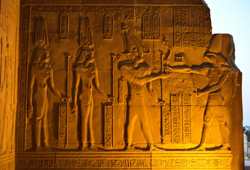 Ptolemy XII receiving scepter from the god Horus on wall of Kim Ombo Temple.