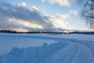 sunny, snowy winter day in the countryside