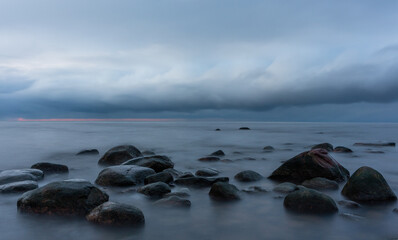 Wonderfully beautiful sunset by the sea in winter with ice