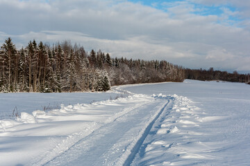 sunny, snowy winter day in the countryside