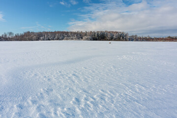 sunny, snowy winter day in the countryside