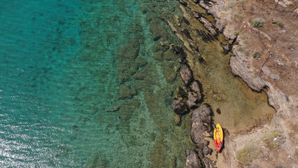 Aerial drone photo of tropical exotic paradise bay with deep turquoise sea forming a blue lagoon