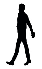 Silhouette of a man walking with a cell phone in his hand