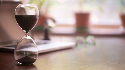 Zoom background, hour glass and laptop, deadline concept, home office