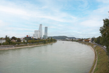 Fototapeta na wymiar View of the Rhine river as it passes through the city of Basel in Switzerland.