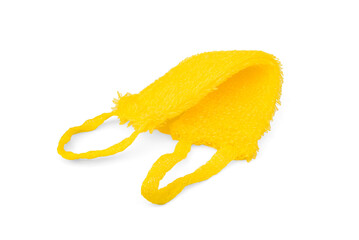 Yellow washcloth for shower with handles made of natural loofah isolated on white background.