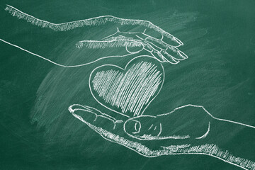 Male and female hands with heart. Concept of Love, Life, Care, Compassion, Mercy, Philanthropy, Health. I Love You. Happy Valentine's day. World heart day. Chalk drawn illustration.