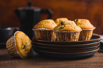 Sweet vanilla muffins on plate.