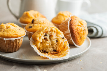 Sweet vanilla muffins on plate.