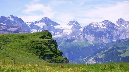 Swiss flag, landscape of Monch, Eiger, and Jungfrau mountains. Switzerland most popular destinations for tourists.