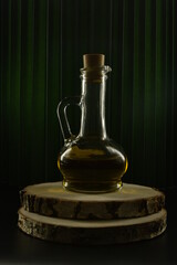 Obraz na płótnie Canvas bottle of oil on wooden background