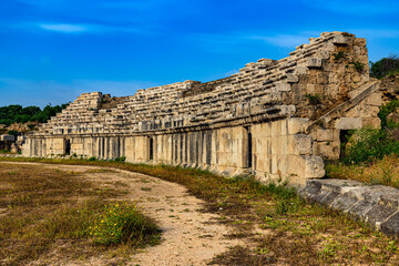 Fototapeta na wymiar Lebanon. Ancient Tyre (UNESCO World Heritage Site) - Al-Bass Archaeological Site. Roman Hippodrome, restored seats