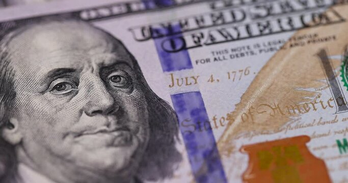 One hundred American dollars close-up, details of a genuine American 100 banknote