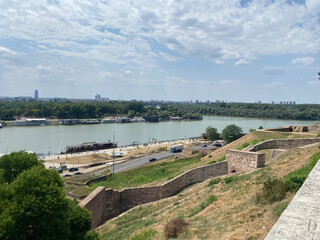 Fototapeta na wymiar A bird's-eye view of the Tuna and Sava rivers from the historical structure of Kalemegdan, Belgrade, Serbia with castle ruins