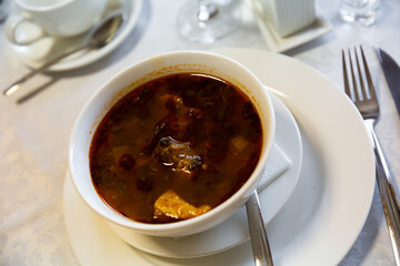 Traditional soup of Georgian cuisine Kharcho from beef meat in a plate