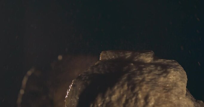 Water Drips Off Stalactite Into Pool On Top Of Stalagmite