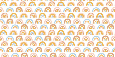 Abstract rainbow seamless pattern illustration. Soft pastel color doodle rainbows in childish freehand style for children or cute background design.