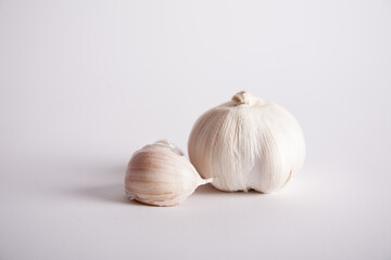 White Garlic bulb and clove on white background