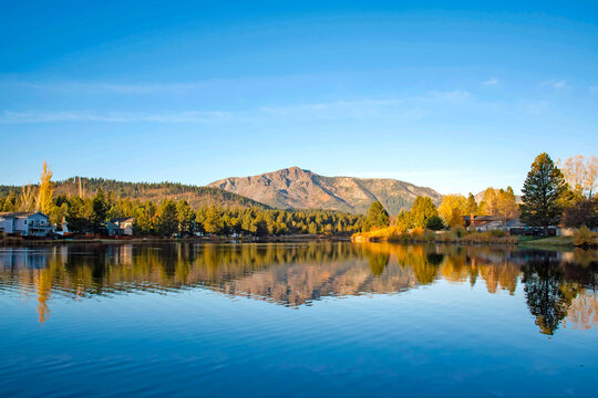 Mountain Peak Reflecting on Lake at Sunrise in Lake Tahoe - Powered by Adobe