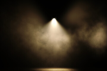 Fog filled stage with a spot light, warm light