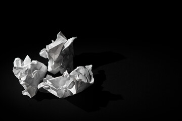 Crumbled white piece of paper