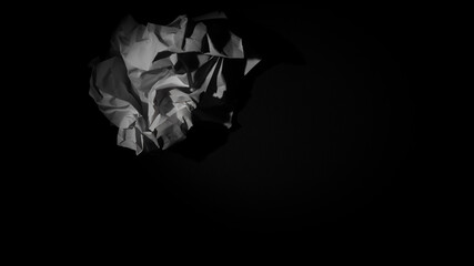 Crumbled white piece of paper