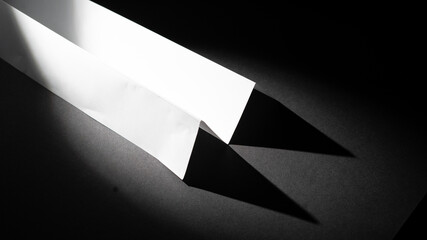 Folded white piece of paper