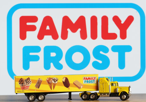 In this photo illustration, a model of a truck with an inscription Family Frost  on the background of the company logo on the monitor screen.