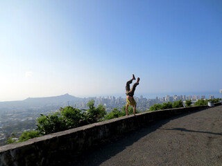 Man Performing Handstand at Tantalus Lookout Point