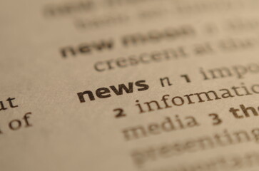 news word in dictionary close up
