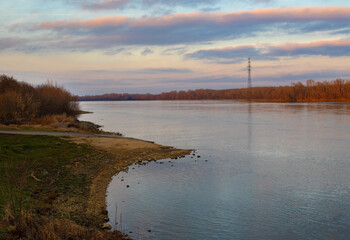 Sunset over the river near Ecser, in Hungary.