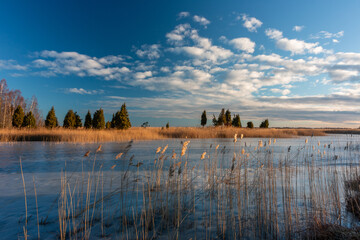 Lake landscape with blue sky and white clouds