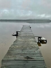 Fototapeta premium wooden pier on the lake in karelia