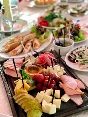 table setting with appetizers, plates, glasses