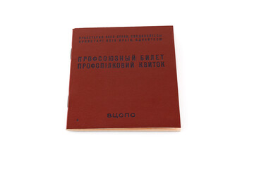 Trade union card USSR, ticket isolated on a white background. Retro cover of from red imitation leather. Russian and Ukraine text - trade-union card, proletarians all countries unite