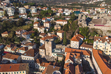 Fototapeta na wymiar Herceg Novi town and Kotor bay, aerial drone view of Herzeg Novi panorama, Montenegro, with old town scenery, fortress mountains, Mount Orjen Adriatic sea coast in a sunny day