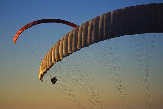 Paraglide canopy with another paraglider in background, La Jolla, CA.