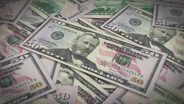 Pile of american dollars cash money, inflation concept. Closeup new american fifty dollar bills 4k resolution