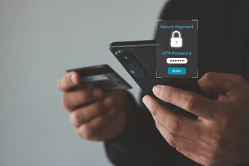 Secure online payment concept. Close-up male hands holding credit card and mobile smartphone, young man paying online, using banking service, entering information, shopping, ordering in internet store